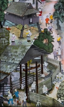 CHIANG MAI,THAILAND - OCTOBER 27, 2014 : Thai mural painting of Lanna people life in the past on temple wall of Wat Chaimongkol Temple in Chiang Mai, Thailand.