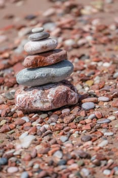 Pile of stacked stones on the beach, coast of Montenegro