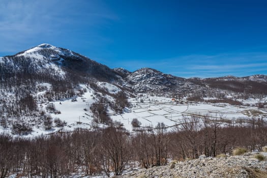Stunning mountain winter landscape panorama in Lovcen National Park, Montenegro