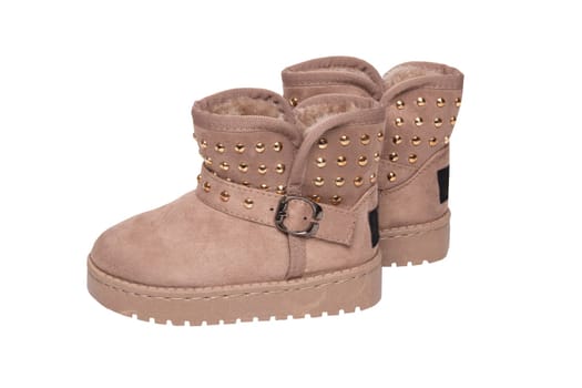 Winter boots. A pair brown suede leather winter boots and lined with fur.  Isolated on a white background. Shoe fashion new collection winter 2018 to 2019.