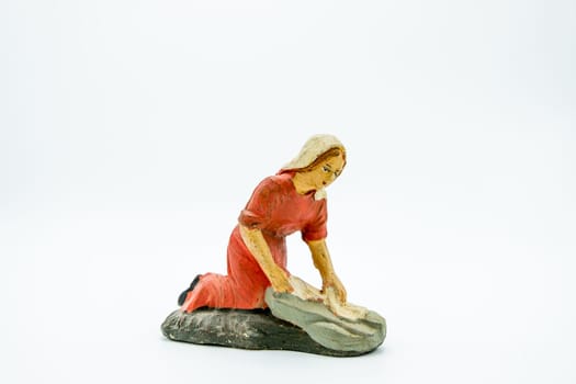 Christian nativity scene figure isolated on white background. Traditional Italian "presepe"" figurines."