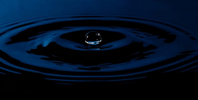 Water Droplet with Ripples blue and black.