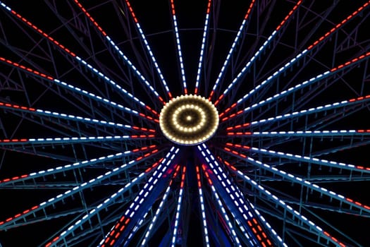 illuminated ferris Wheel at night