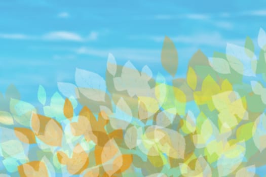 Autumn background. Abstract autumn or bright summer landscape texture with leaves and blue bright sky and clouds. Autumn or summer background with copy space.