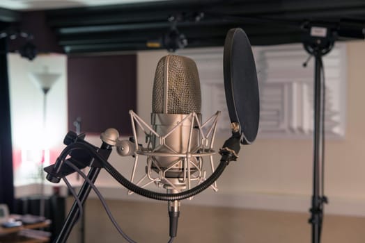 professional microphone in a recording studio
