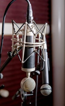 professional microphones in a recording studio
