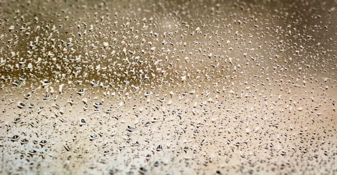 Raindrops on glass. Pattern Effect. Seasonal concept