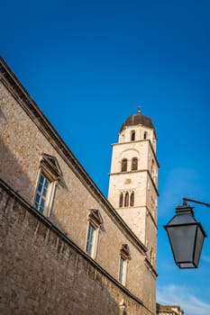 Tall Dominican church bell tower in Dubrovnik Old Town, Croatia