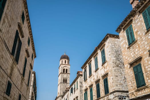 Tall Dominican church bell tower in Dubrovnik Old Town, Croatia