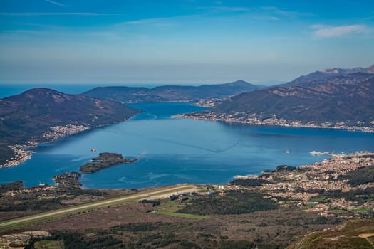 View of Tivat airport, town and the stunning landscape of the Bay of Kotor in Montenegro as seen from the road to Lovcen National Park
