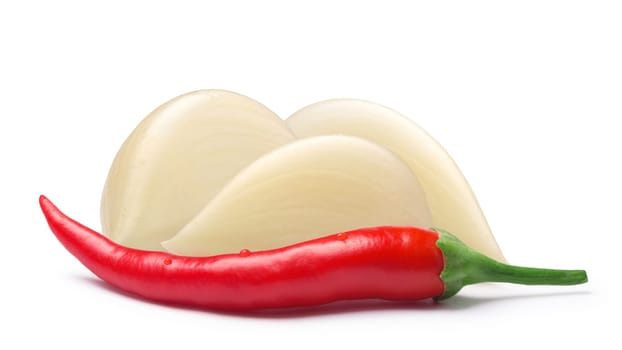 Husked and split garlic cloves with cayenne pepper. Clipping paths, shadow separated. Design elements