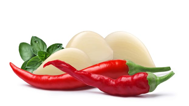 Garlic cloves with oregano and cayenne pepper. Clipping paths, shadow separated. Design elements