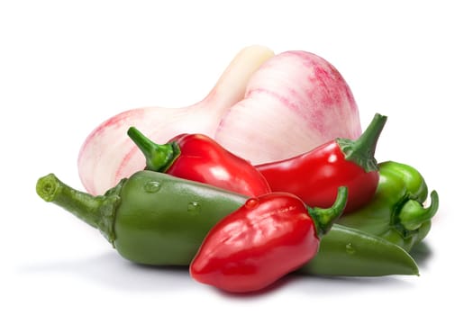 Garlic, red and green habanero peppers, chili. Ingredients for hot sauce, ketchup, tabasco. Clipping paths, shadow separated