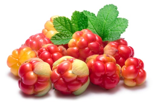 Pile of cloudberries (Rubus Chamaemorus) with leaves. Clipping paths, berries and shadow separated, infinite depth of field