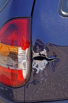 Damaged metak car side after traffic accident