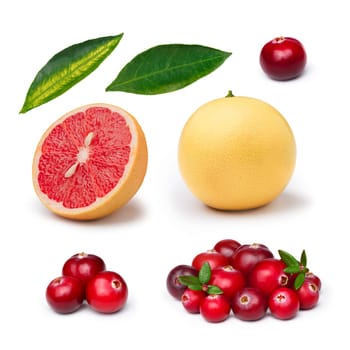 Set of cranberries, whole and sliced pink grapefruit isolated on white. Exploded view. Large depth of field