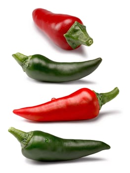 Set of standalone red and green hot chili peppers. Clipping paths, shadows separated, infinite depth of field. Design elements