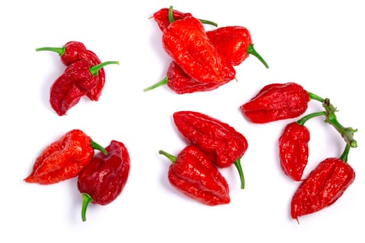 Piles of Bhut Jolokia ghost chili peppers (Capsicum frutescens x Capsicum chinense hybrid). Clipping paths for each object, shadows separated, top view
