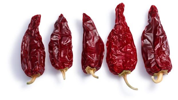 Chiles seco del norte, a ripe dried Anaheim peppers. Clipping paths, shadows separated, top view