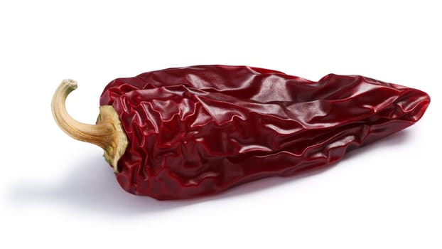 Chile seco del norte, a ripe dried Anaheim pepper. Clipping paths, shadows separated
