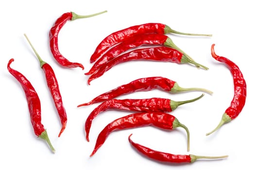 Dried De Arbol chiles, single pods, whole. Clipping paths, shadow separated, top view