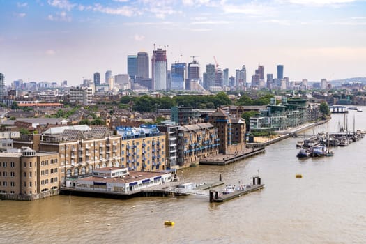 London cityscape with River Thames to Canary Wharf skylines building in London UK