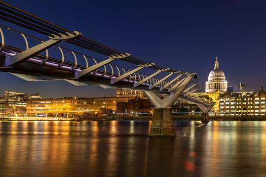 St paul cathedral with millennium bridge sunset twilight in London UK.