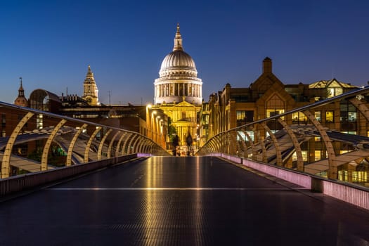 St paul cathedral with millennium bridge sunset twilight in London UK.