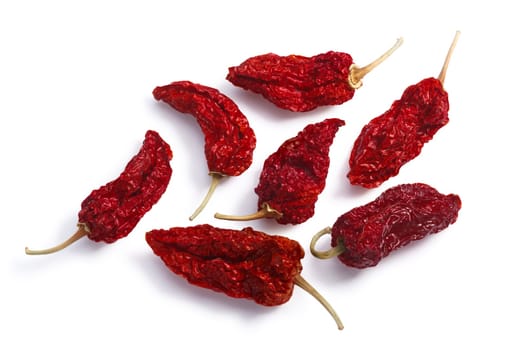 Dried Bhut Jolokia Ghost chile peppers, whole pods. Clipping paths, shadows separated, top view