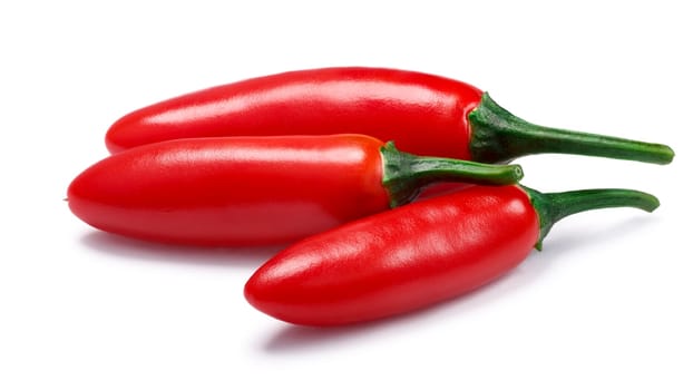 Serrano Tampiqueno chile peppers (Capsicum annuum), red ripe. Clipping paths, shadow separated
