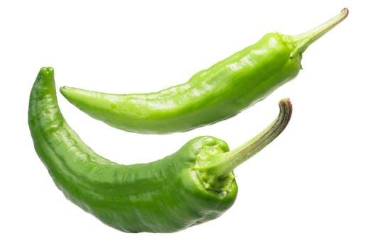 Crooked Green Chile Peppers (C. annuum). Clipping paths