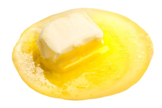 Melted butter with butter piece floating
