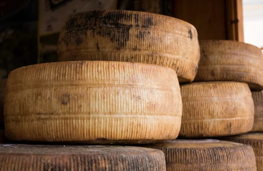 Handmade local cheese assortment, on a fair of traditional products
