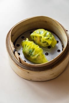 Chinese dim sum in wooden basket