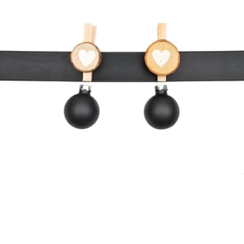 Background with black ribbon and christmas baubles