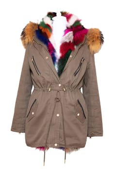 Woman coat isolated. A luxurious and stylish elegant parka with colorful fur on mannequin isolated on a white background. Winter fashion.