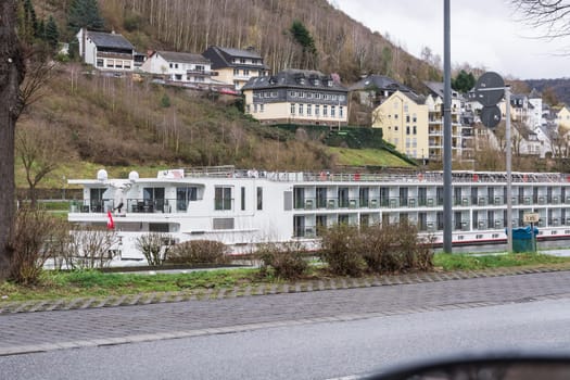 COCHEM, GERMANY - MARCH 27, 2016:.River cruises with cruise ship Viking Modi on the Moselle near Cochem. Large hotel ship for a river cruise along the Mosel.