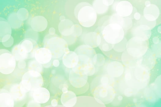 Abstract blurred green yellow gradient pastel background texture with white bokeh circles.