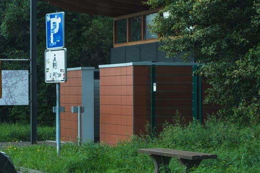 MOTORWAY A 61  GERMANY - AUGUST 13  2017: View from a parking lot to a public toilet on the A 61.