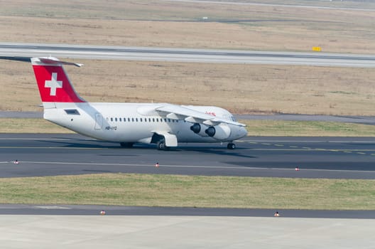 Duesseldorf, Nrw, Germany - March 18, 2015: Aircraft of the airline Swissair during the start-up process at Düsseldorf Airport.