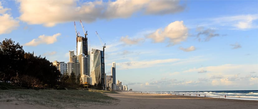 The skyscrapers of the Gold Coast seen from the beach at Broadbeach before sunset.