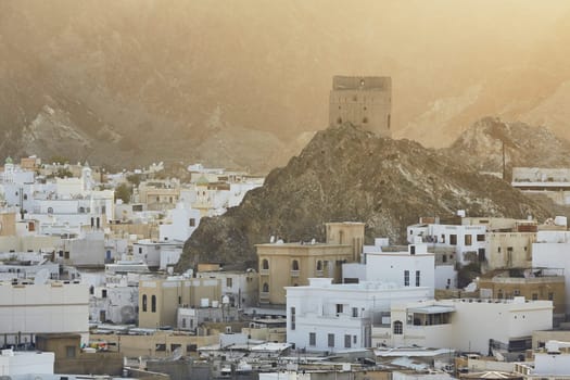 Cityscape view of Muscat city at sunset. The capital of Oman.