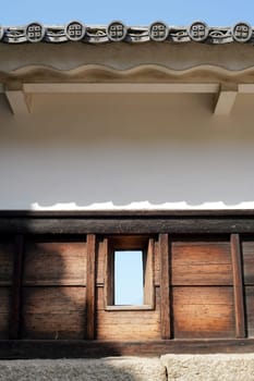 Wall of Japanese castle. The holes are for shooting gun and bow