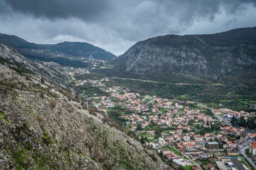 View of the hillside homes in Kotor Bay and town as seen from the small chapel on the hillside above, Montenegro