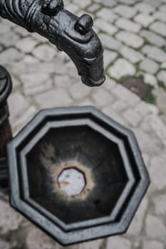 Old drinking water pump in the old town of Kotor, Montenegro