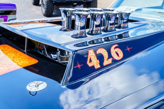 Detroit, Michigan, August 19, 2016: hood fragment of an American muscle car at Woodward Dream Cruise - largest one-day automotive event in USA