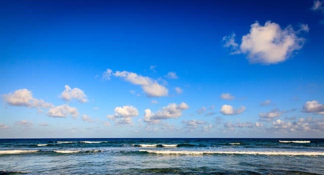 Scenic view of Caribbean Sea and blue sky with white clouds in BVI