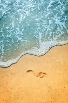 Footprint in the sand on a beach in British Viirgin Islands