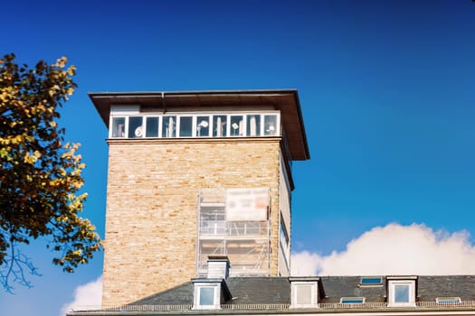 Town Hall with Town Hall Tower in Velbert, NRW Germany against blue sky.