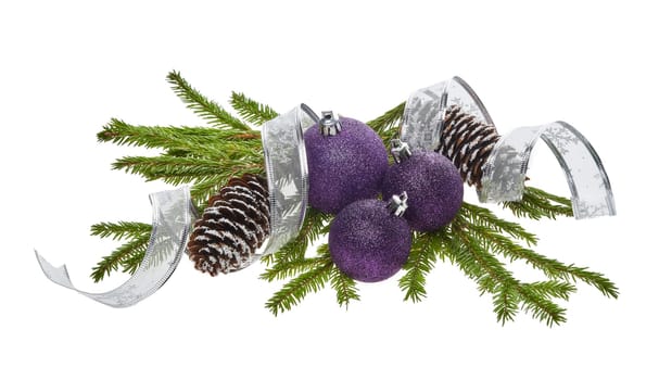 Still life with violet sparkling balls, cones and fir tree branches isolated on a white background. New Year and Christmas decorations